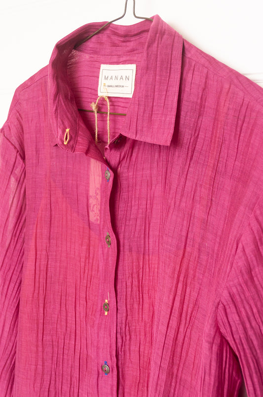 Manan lightweight cotton silk long sleeve button up shirt in magenta pink with orange silk camisole.