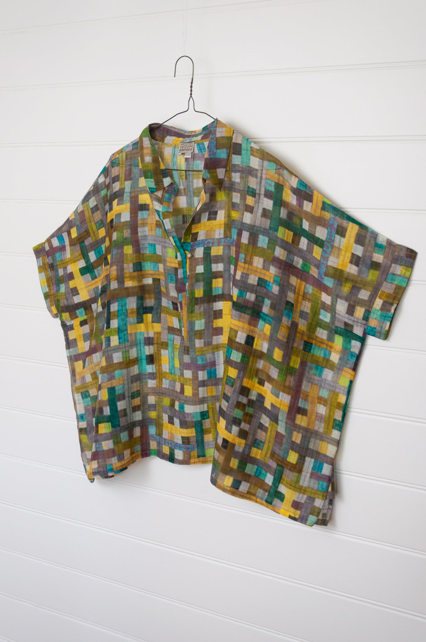 Neeru Kumar fine cotton silk loose fitting blouse shirt in multi coloured check.