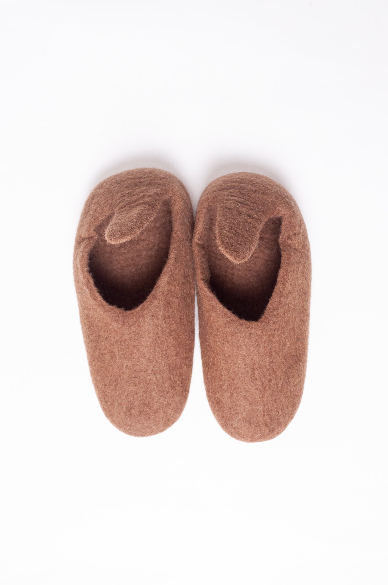 Wool felt pull on slippers in brown.