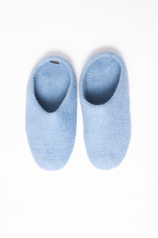 Wool felt slip on slippers in baby blue.