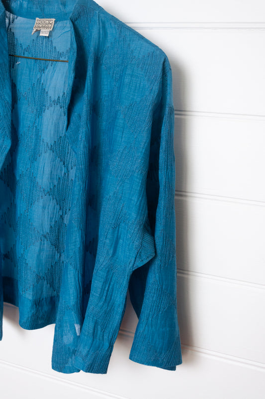 Neeru Kumar cotton silk embroidered unlined cropped jacket in blue.