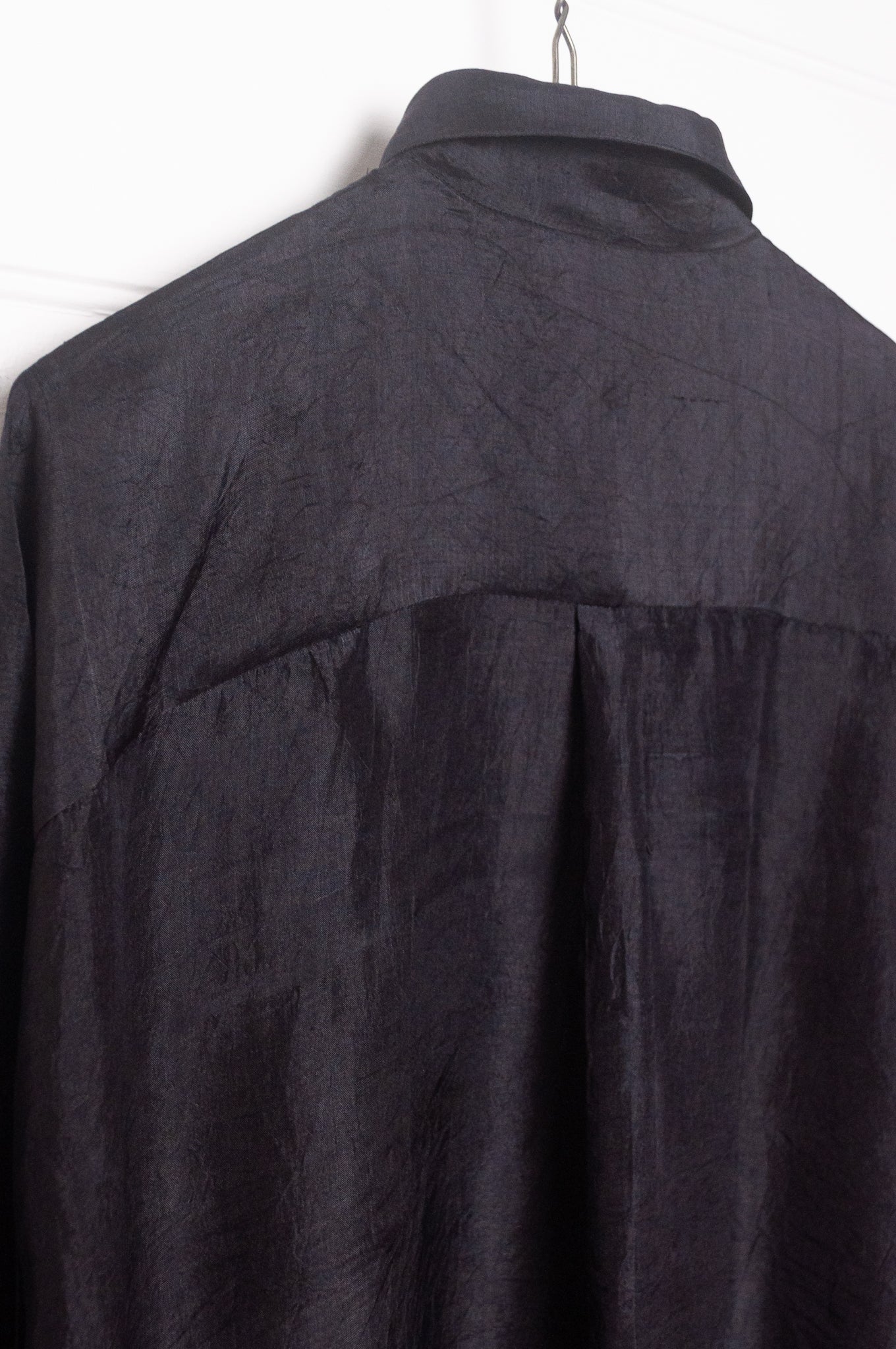 Studio Within x Juniper Hearth oversized pure silk button up long sleeved shirt in black.