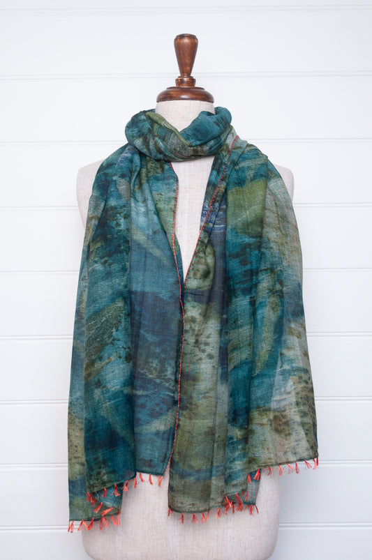 Neeru Kumar cotton silk scarf in blue and green with embroidered edging and tiny tassels.