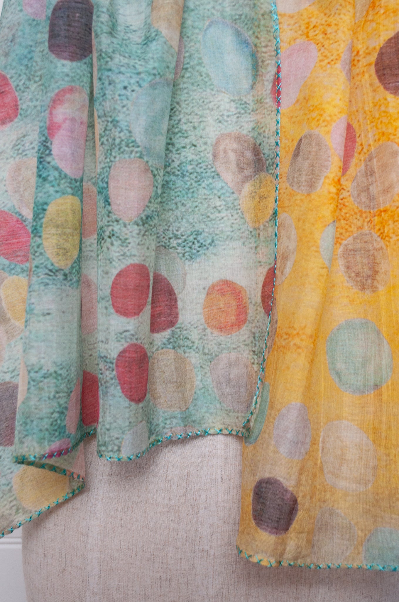 Neeru Kumar cotton silk spotty scarf in blue, orange and yellow with embroidered edging.