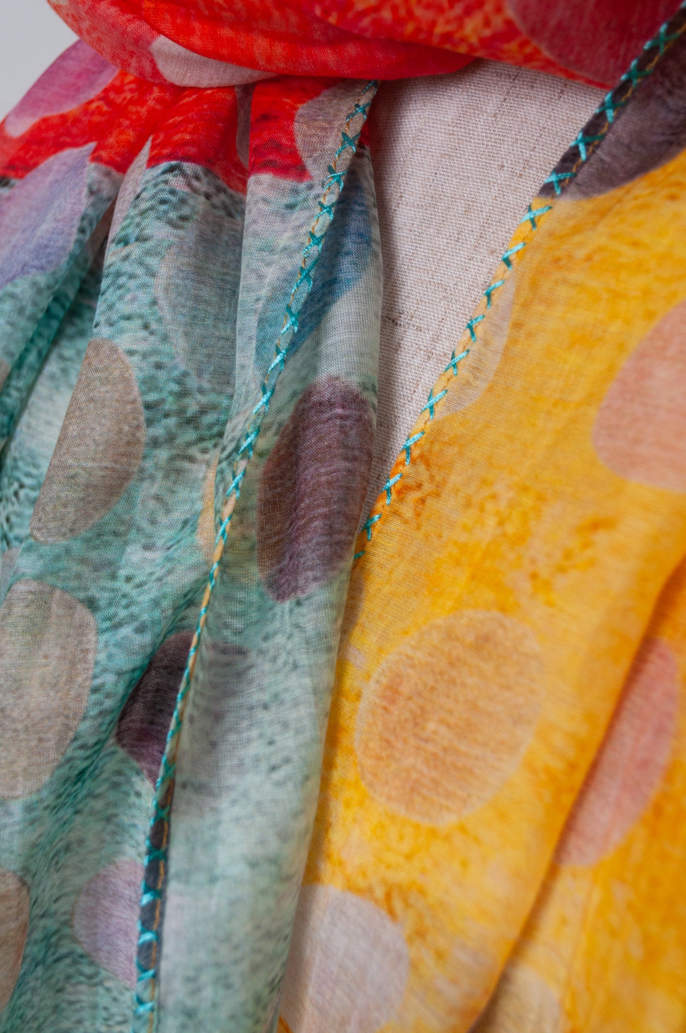 Neeru Kumar cotton silk spotty scarf in blue, orange and yellow with embroidered edging.