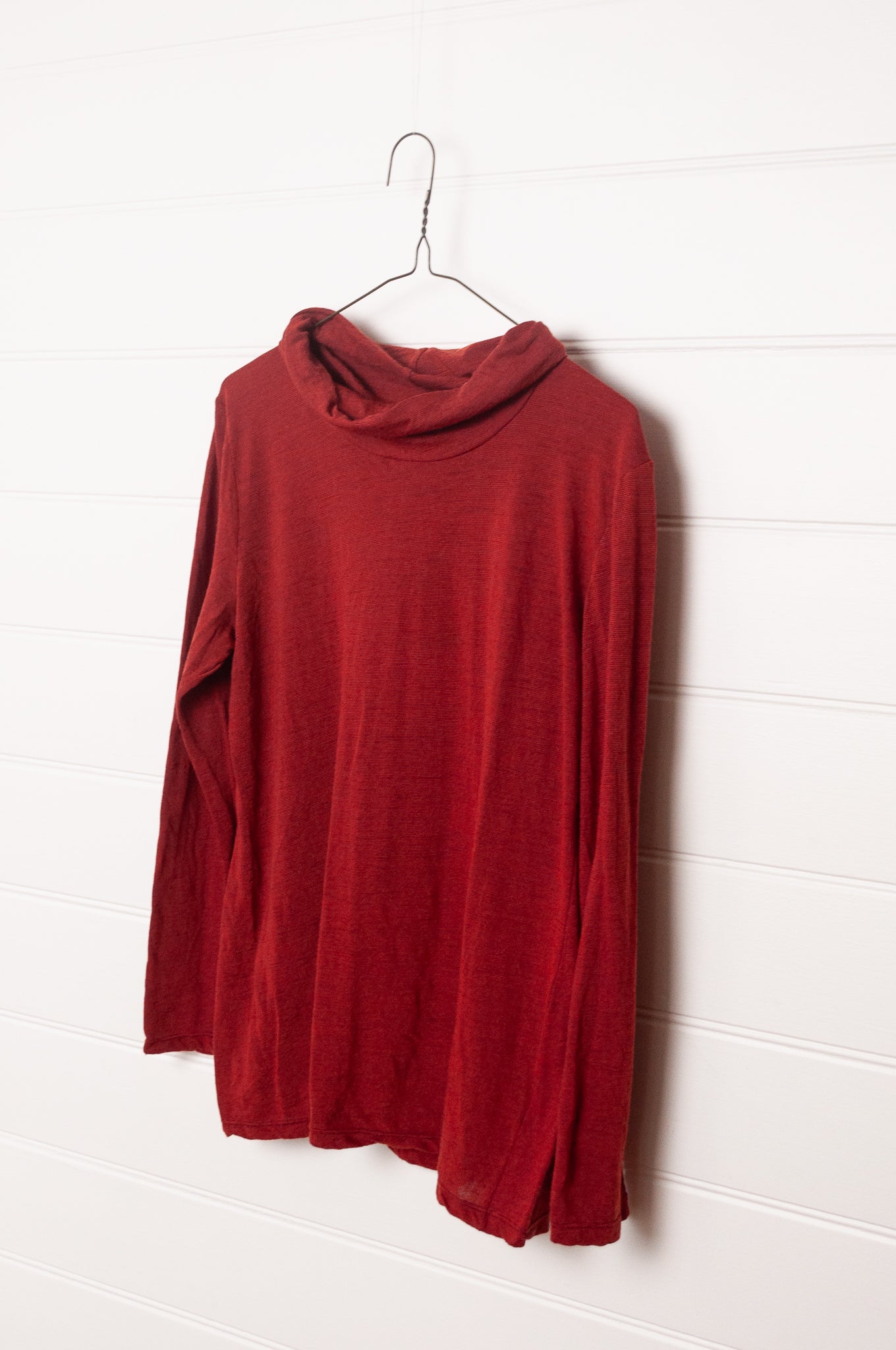 Valia V-merino wool jersey knit roll neck top.