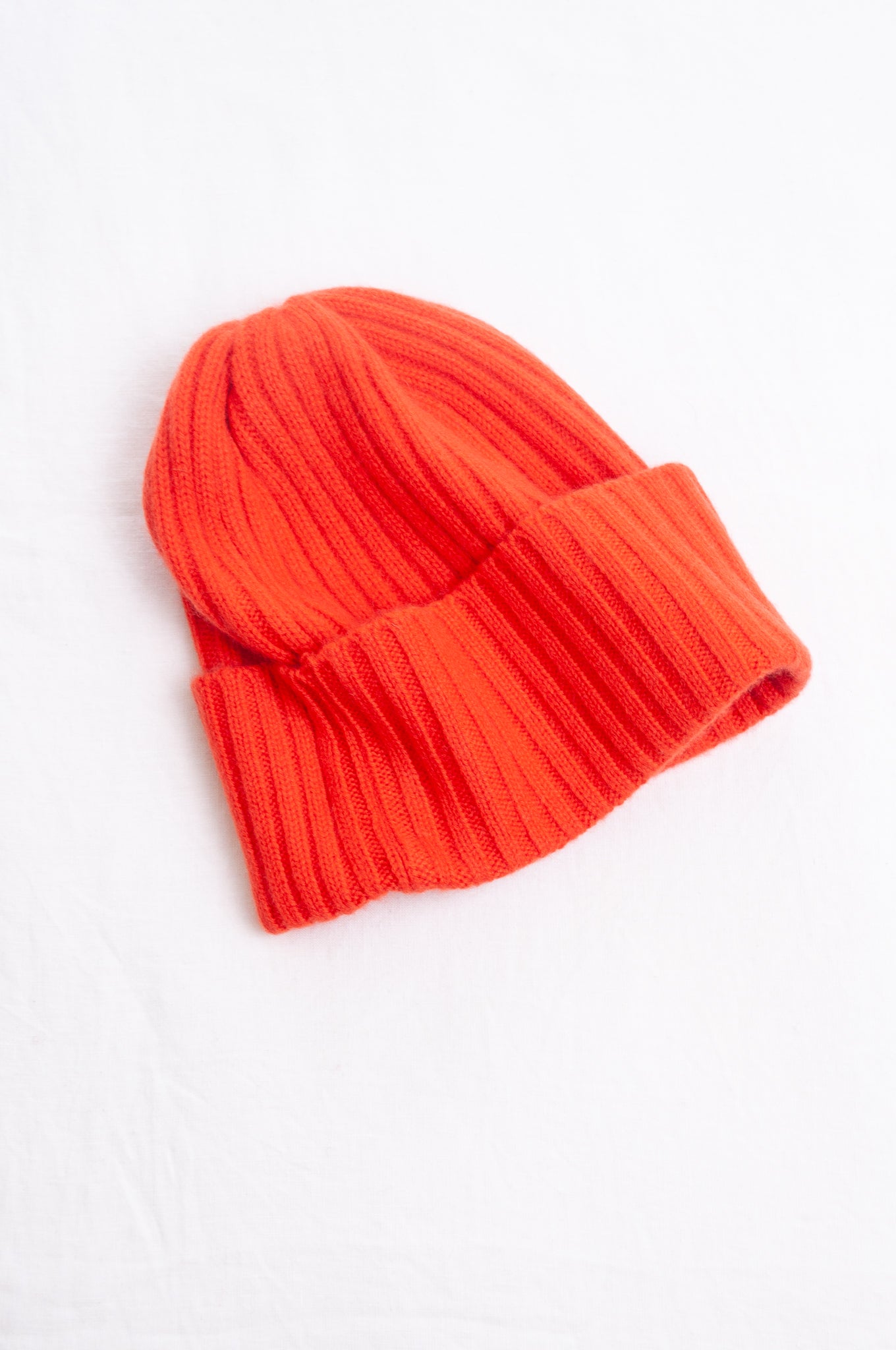 Juniper Hearth ribbed knit cashmere beanie in tangerine, orange red