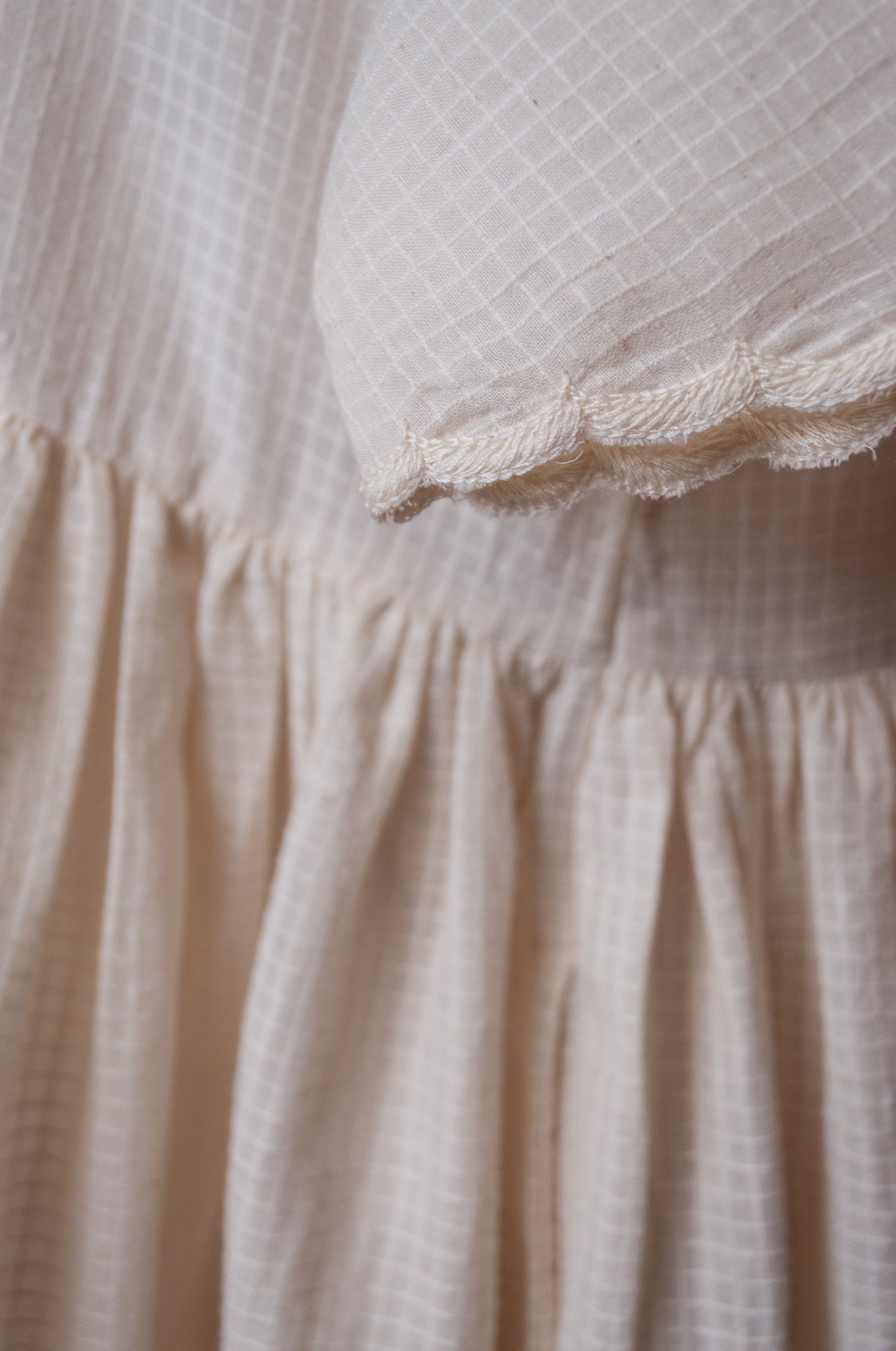 Runaway Bicycle handloom cotton Pipa dress, hand embroidered in natural white.