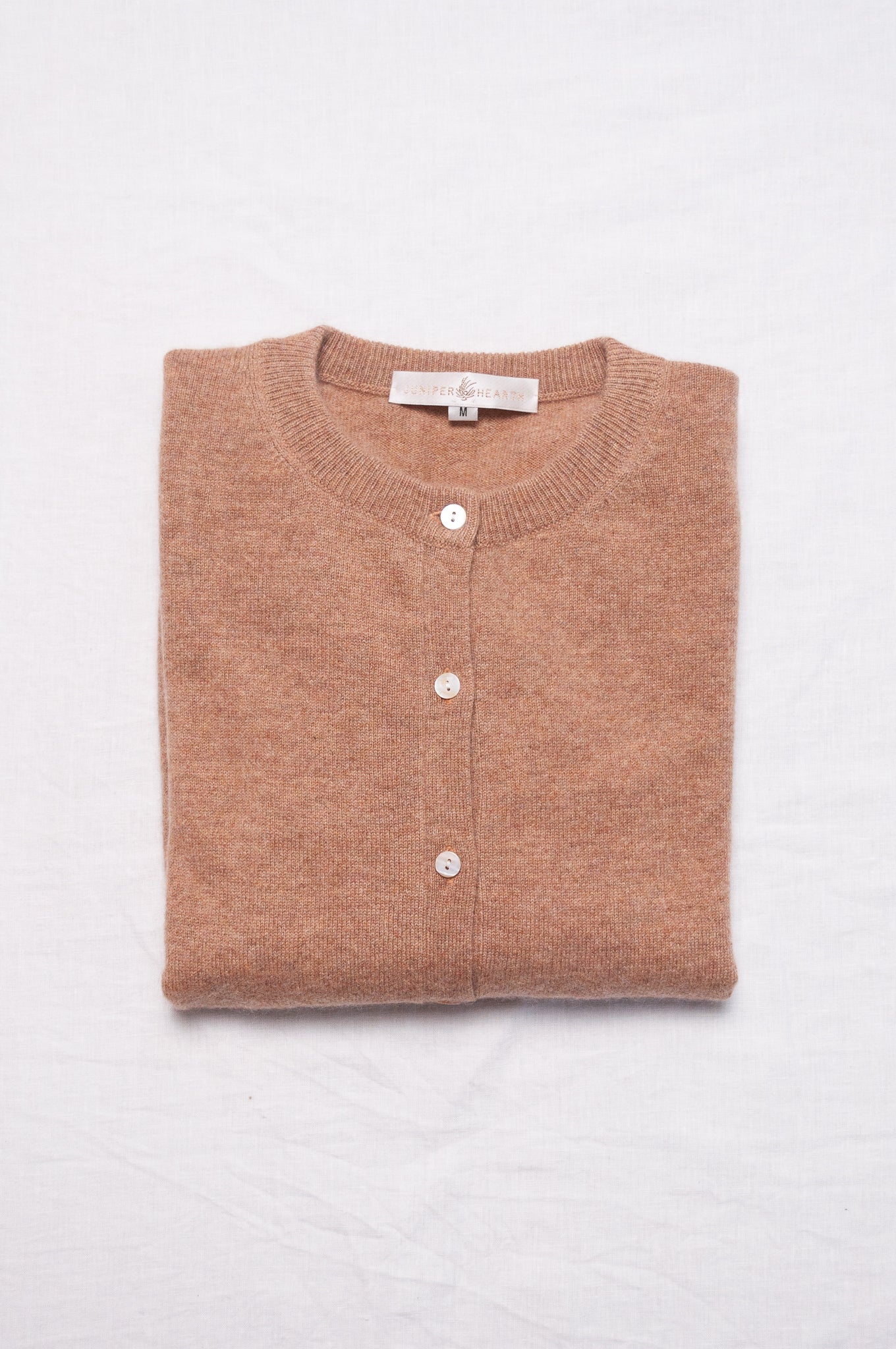 Cashmere button up cardigan in camel brown.