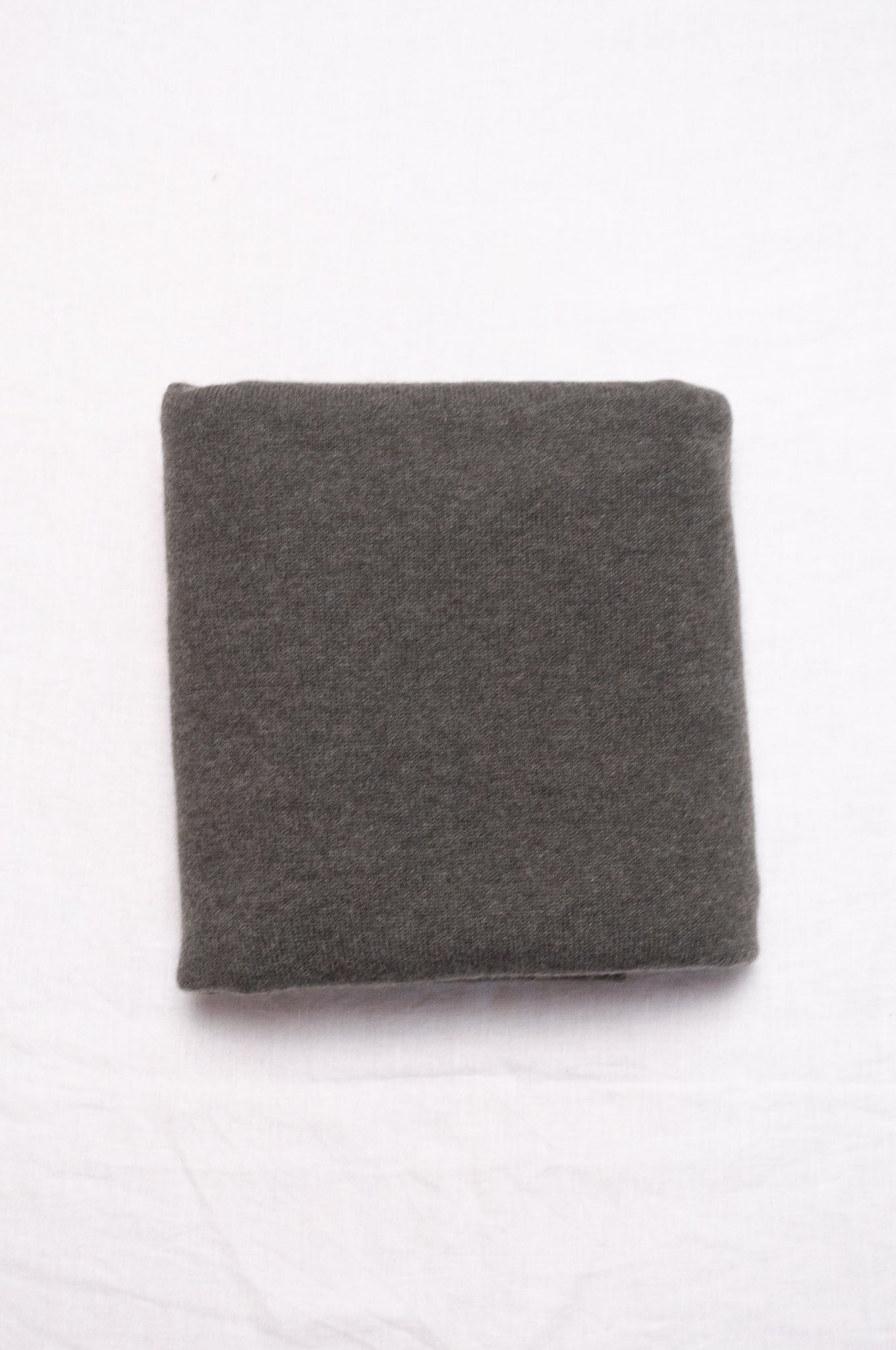 Juniper Hearth pure cashmere cosy scarf in moor green.