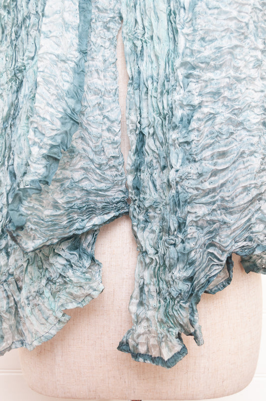 Shibori dyed pure silk crinkle finish scarf in pale blue and white.