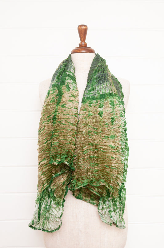 Shibori dyed pure silk crinkle finish scarf in pale bronze and green.