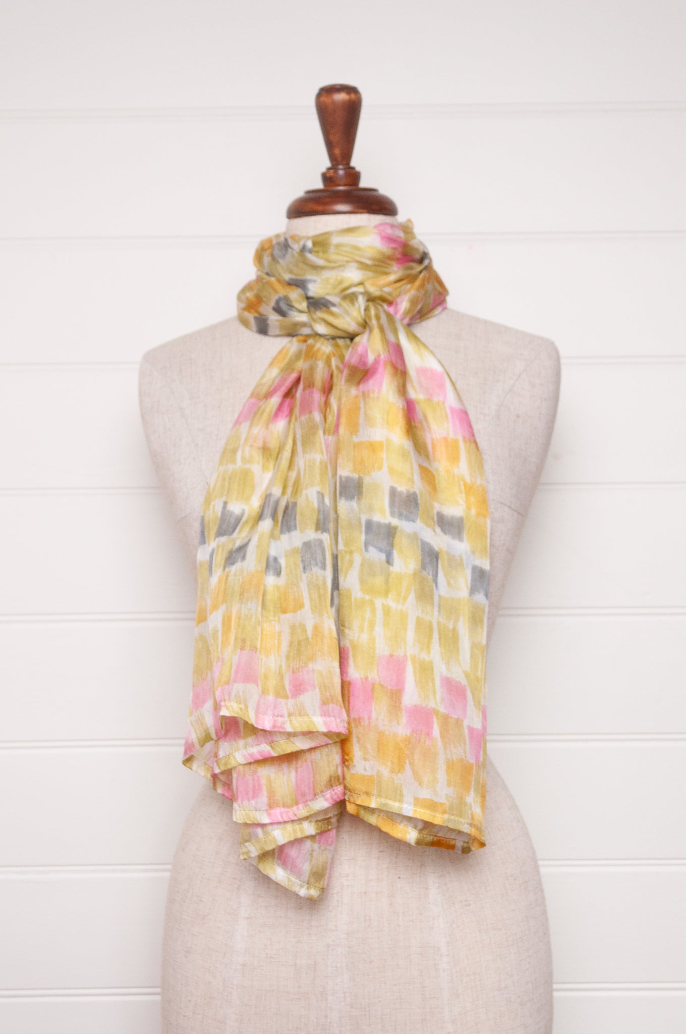 Hand painted pure silk scarf with light olive, pink and grey brushstrokes on white.