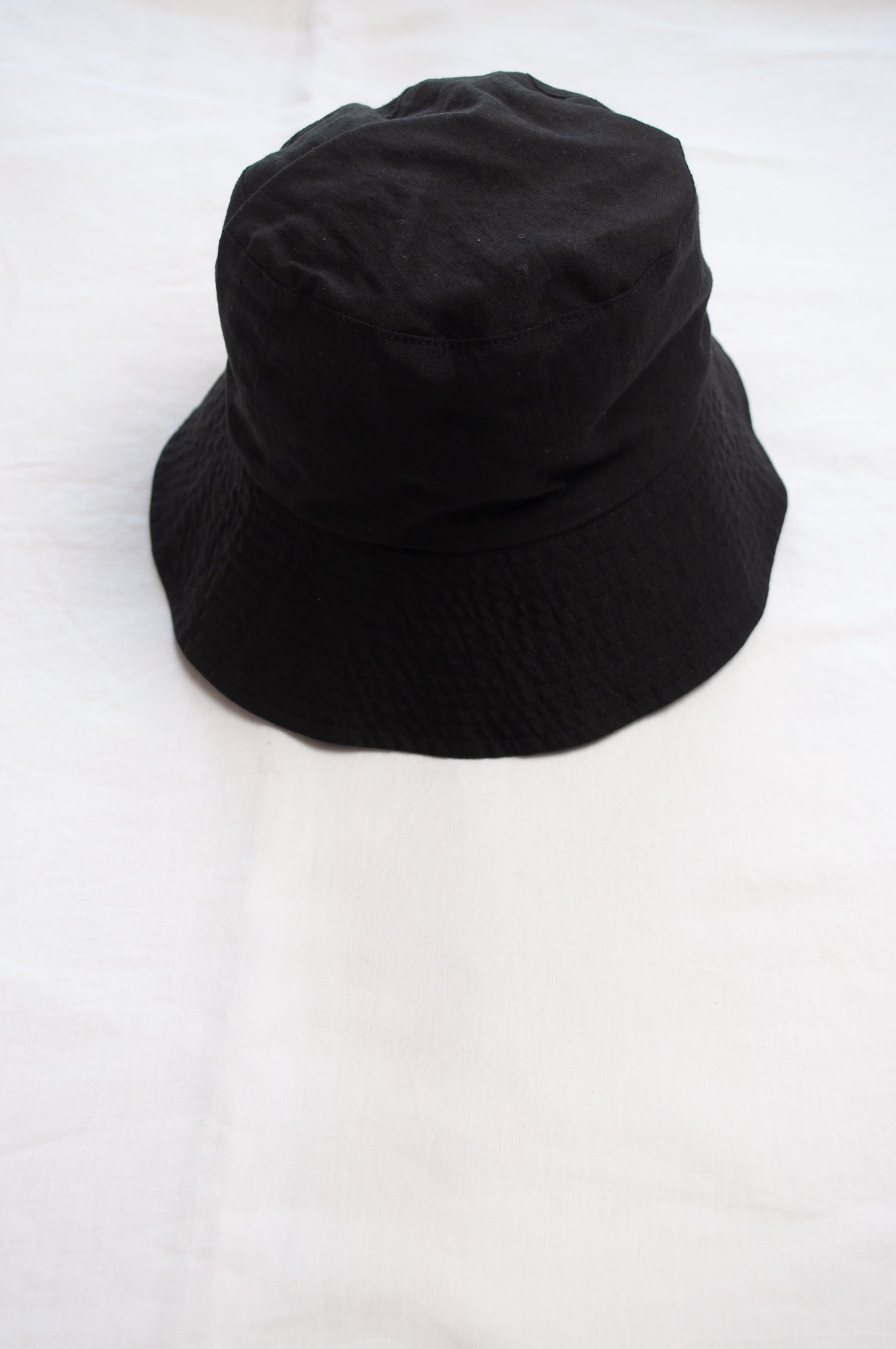 PCNQ Luna made in Japan black foldable linen fabric bucket hat.