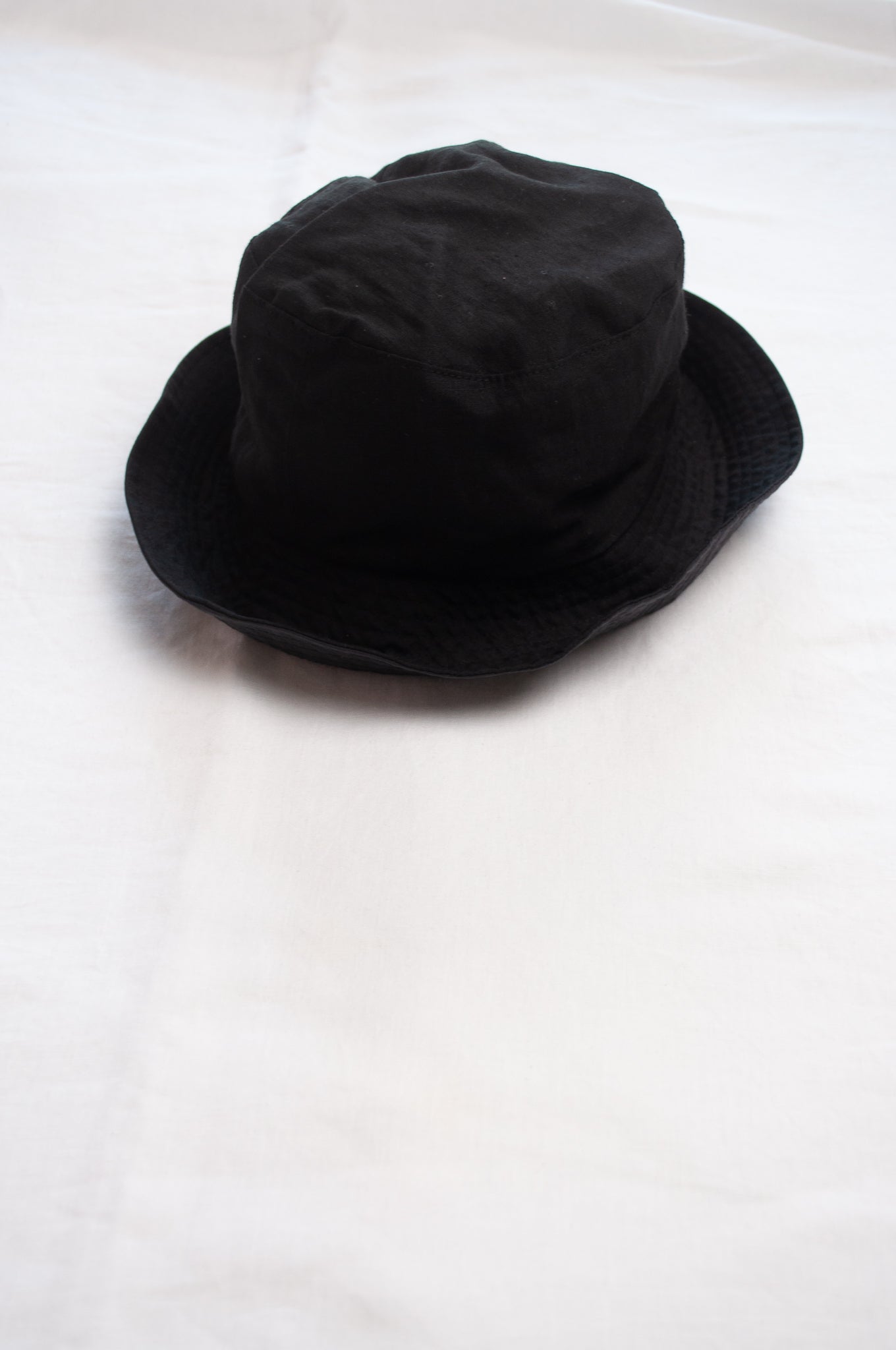 PCNQ Luna made in Japan black foldable linen fabric bucket hat.