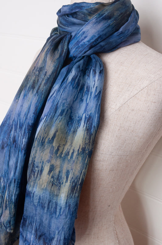 Pure silk shibori dyed scarf in shades of denim blue.