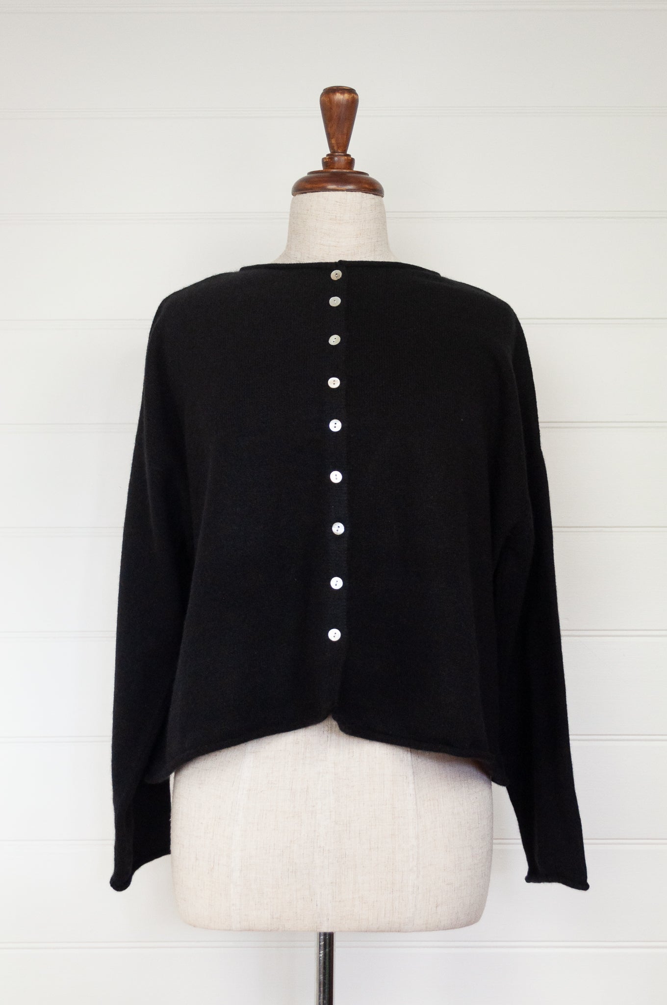One size reversible cashmere cardigan in black.
