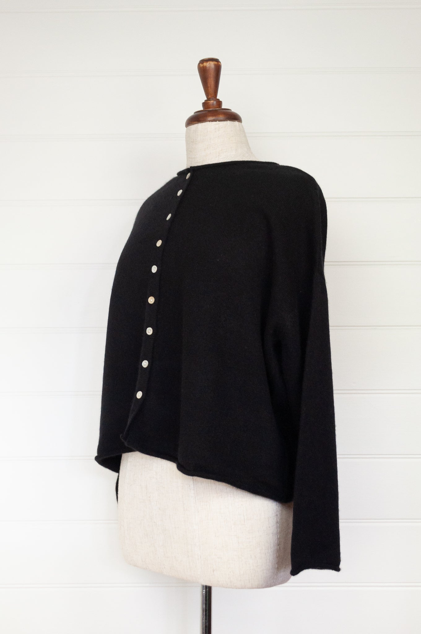 One size reversible cashmere cardigan in black.