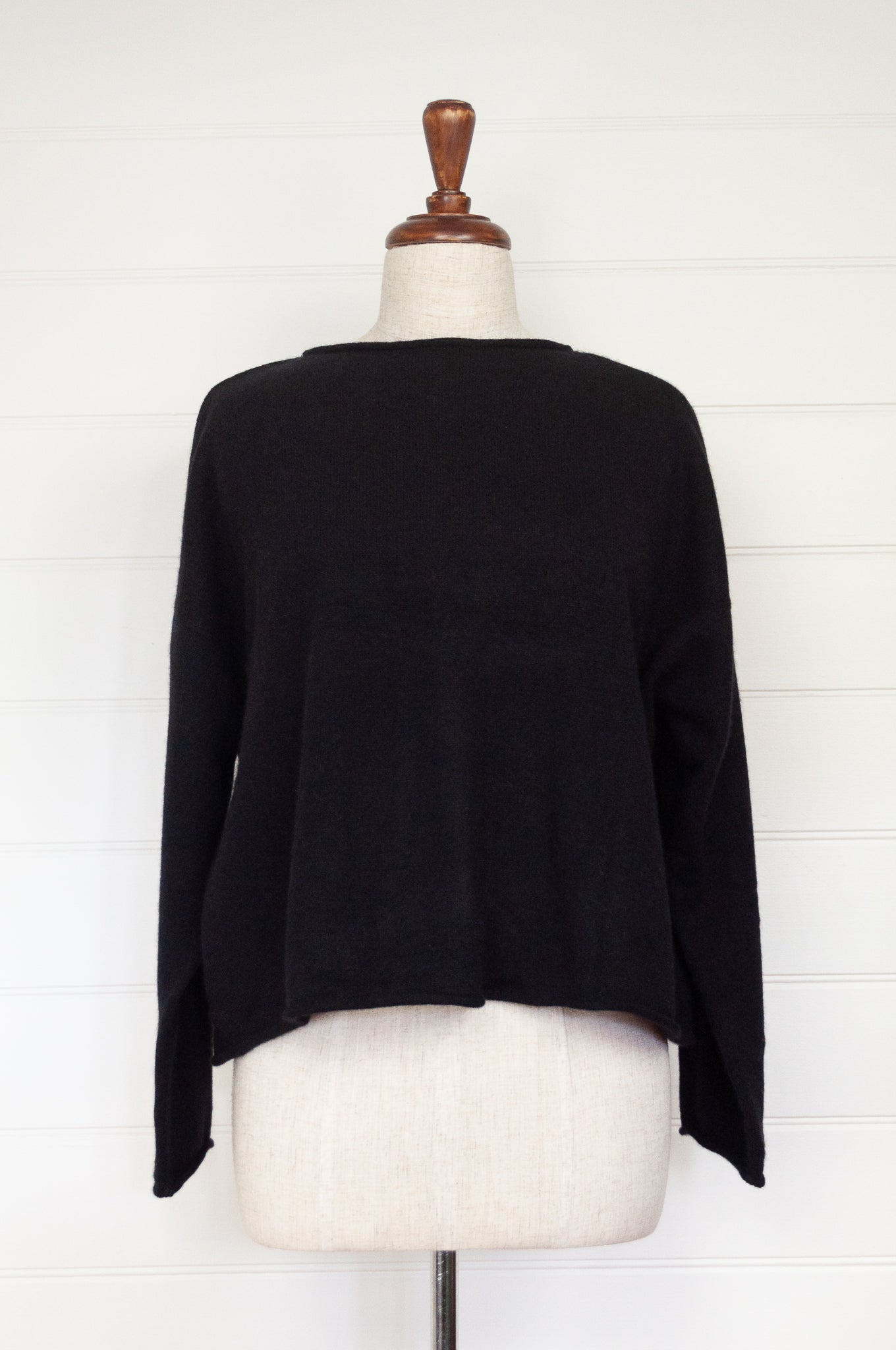 One size reversible cashmere cardigan in black.