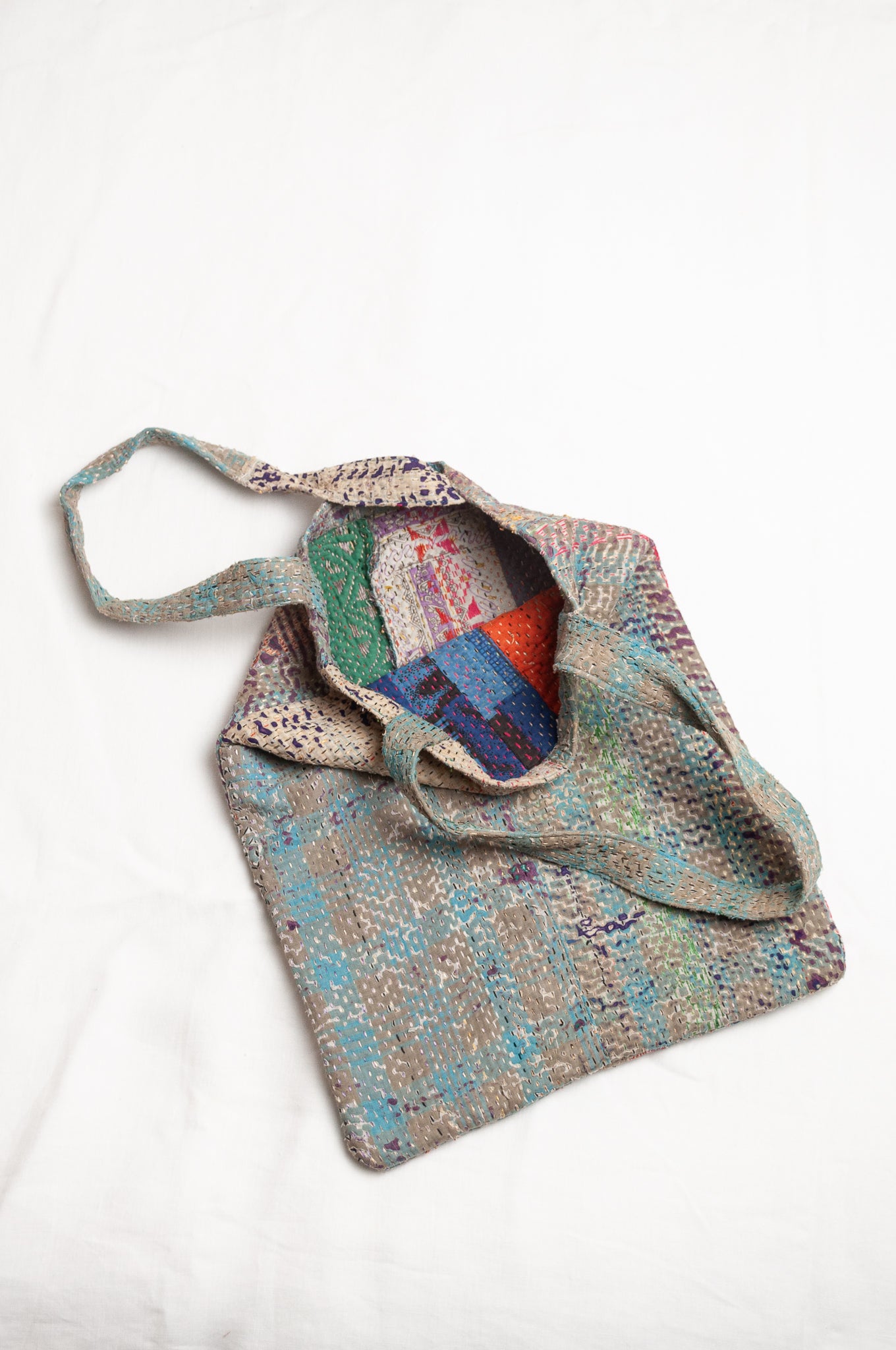 Vintage kantha tote bag, blue with multi colour stripes.