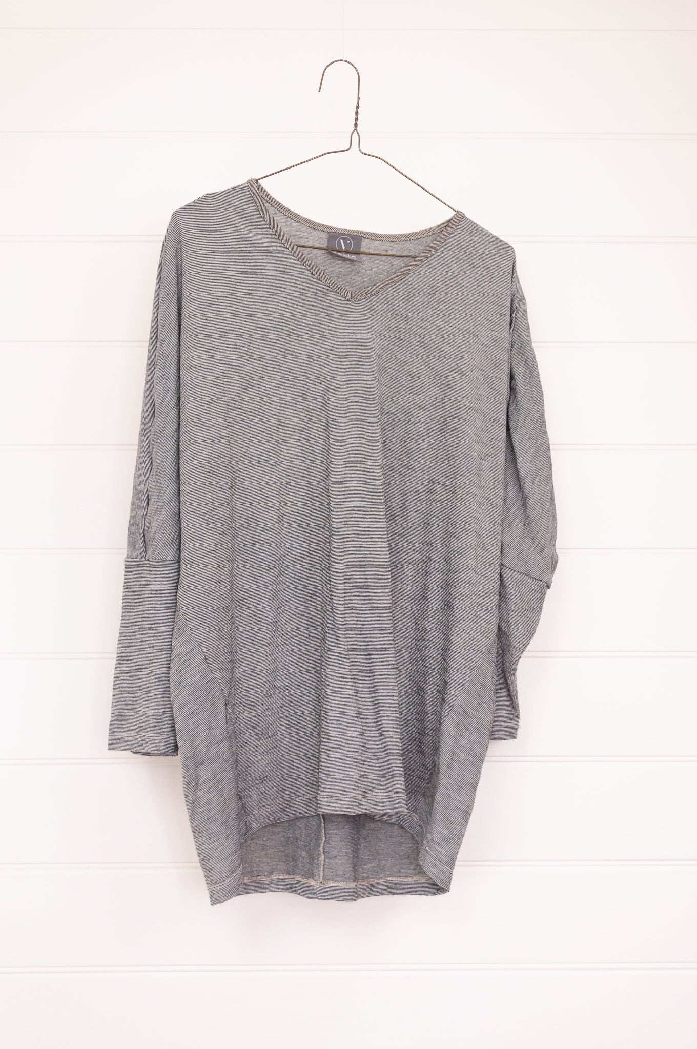 Valia V-merino wool jersey V-neck top in caviar charcoal grey.