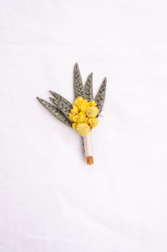 Trovelore hand embroidered and beaded Mimosa boutonniere brooch.
