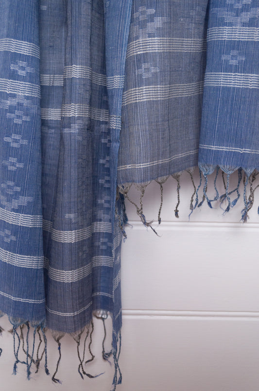 Handwoven light cotton indigo panelled jamdani scarf with stripes and motifs in white.