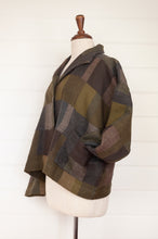 Load image into Gallery viewer, Neeru Kumar Coco jacket in blanket check wool, camouflage tones of grey, olive, khaki, latte and brown.