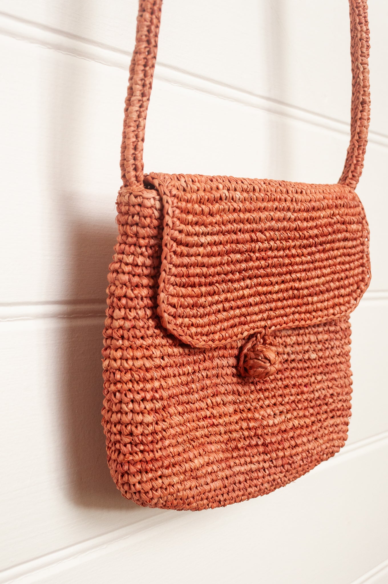 Sophie Digard small cross body crocheted raffia bag in bois de rose, warm pink.