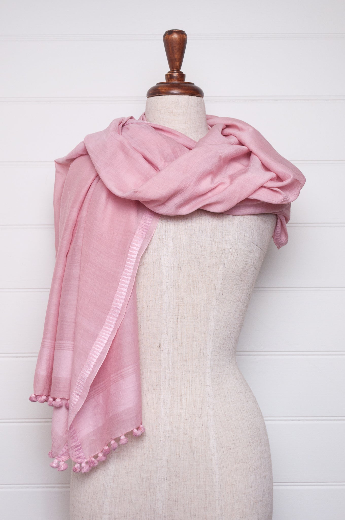 Silk cotton pom pom scarf in lavender pink.