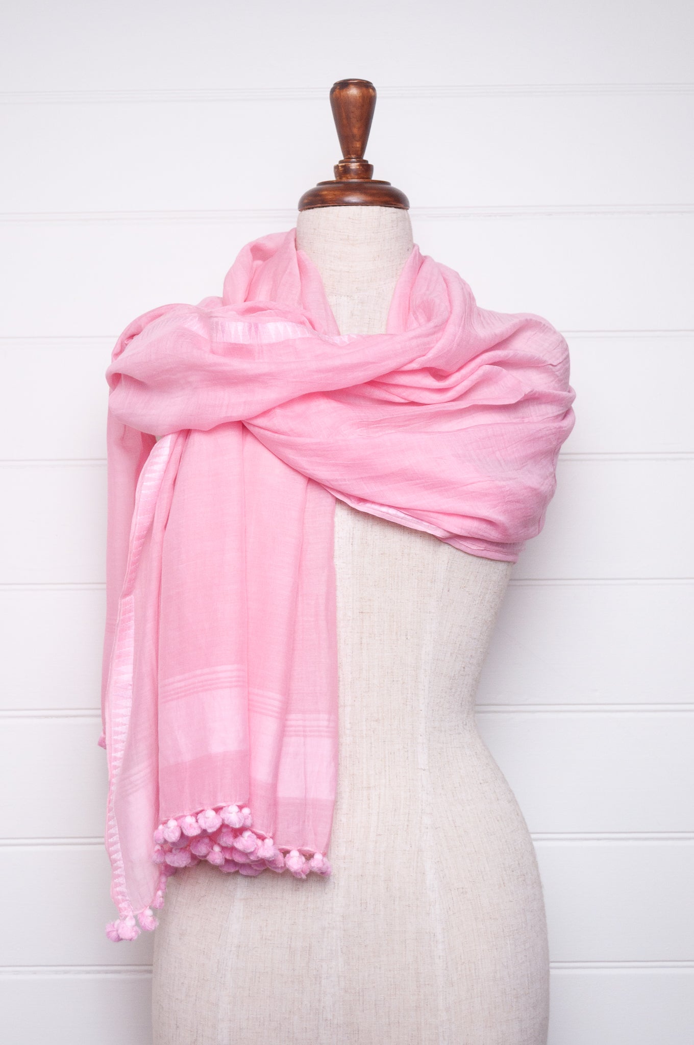 Silk cotton pom pom scarf in petal pink.
