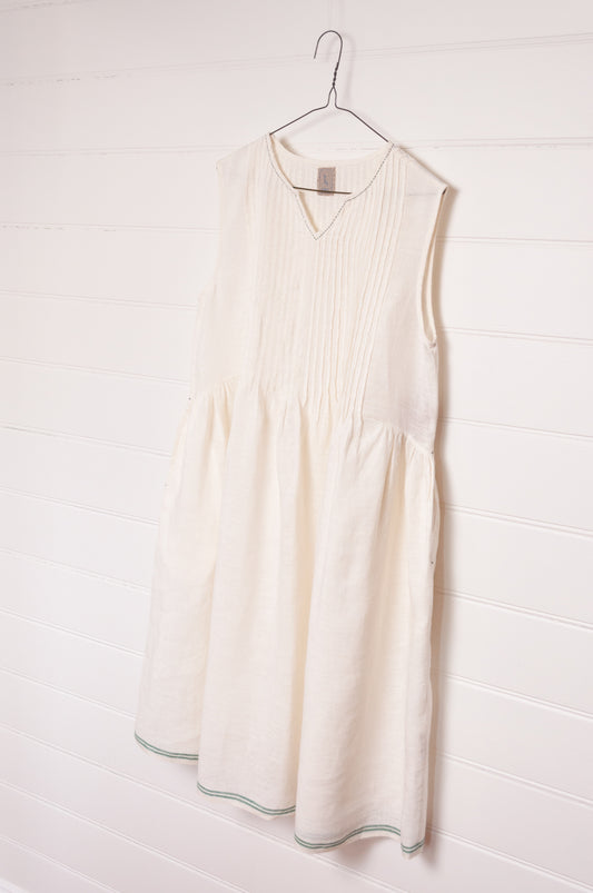 DVE Bhavya natural white linen sleeveless pintucked sun dress.