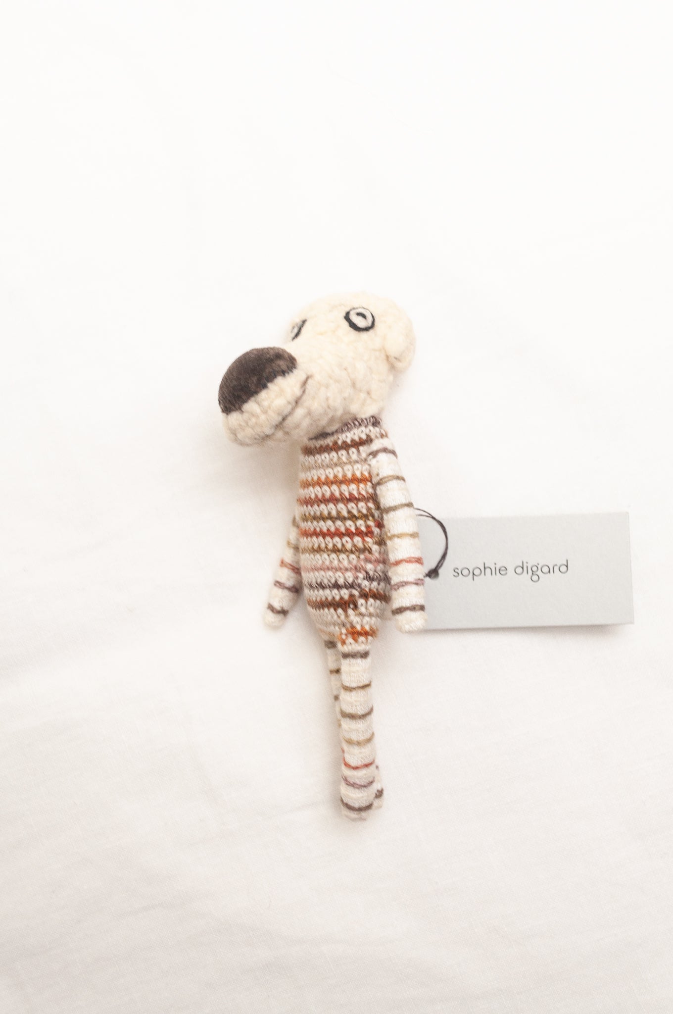 Sophie Digard poupee pure wool dog in oatmeal with striped jumper.