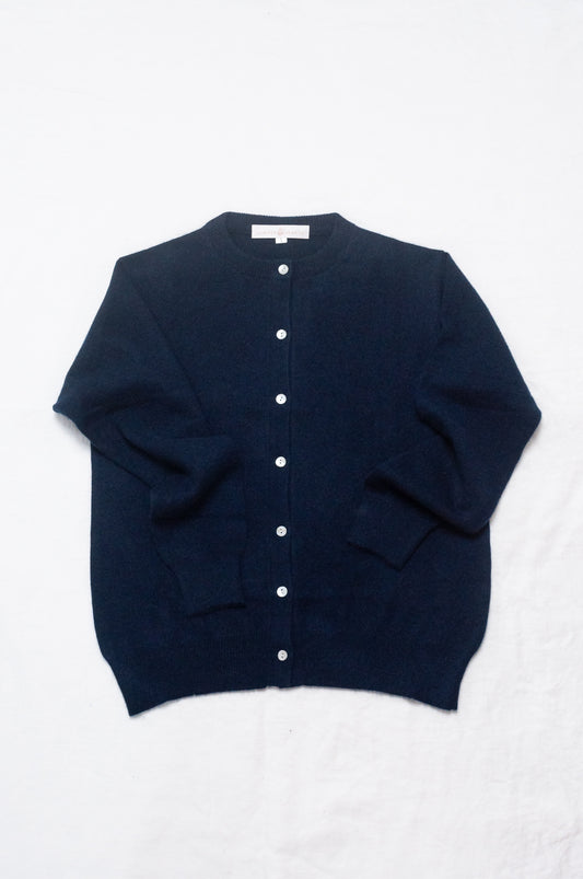 Classic cashmere crew neck cardigan in deep midnight navy blue.