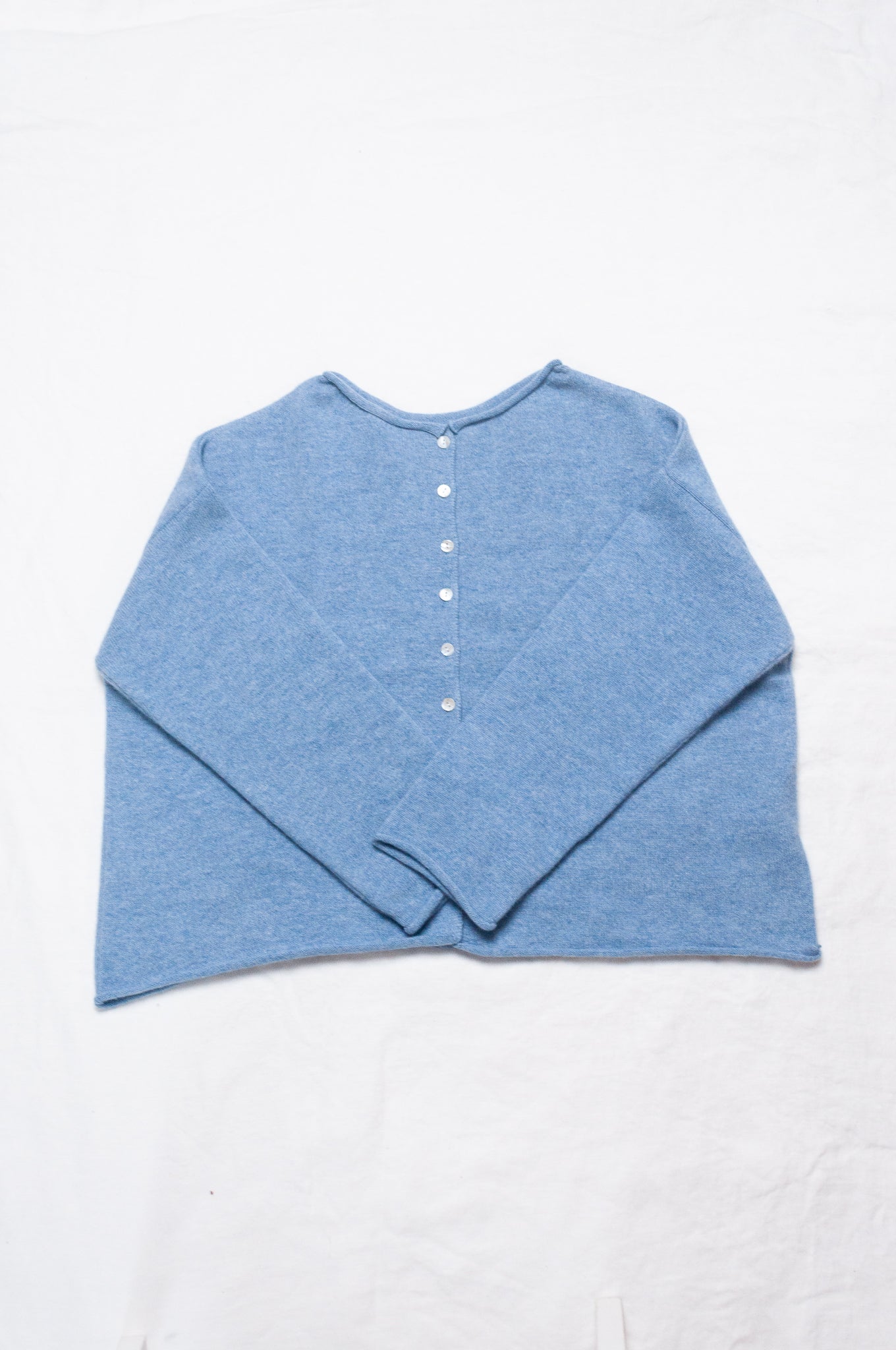 One size reversible cardigan ethically made in Nepal from 100% pure cashmere, in sky blue.