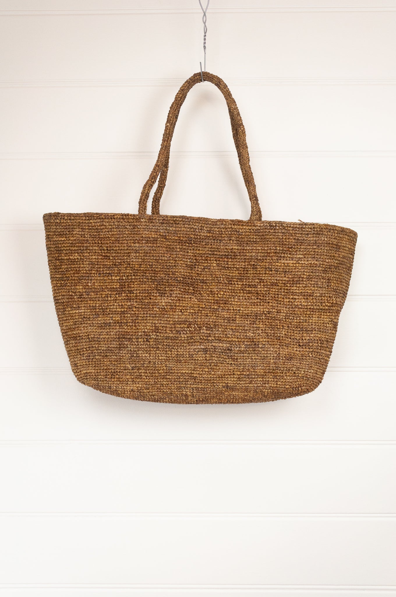 Sophie Digard crochet raffia bag, plain in shades of sand brown.