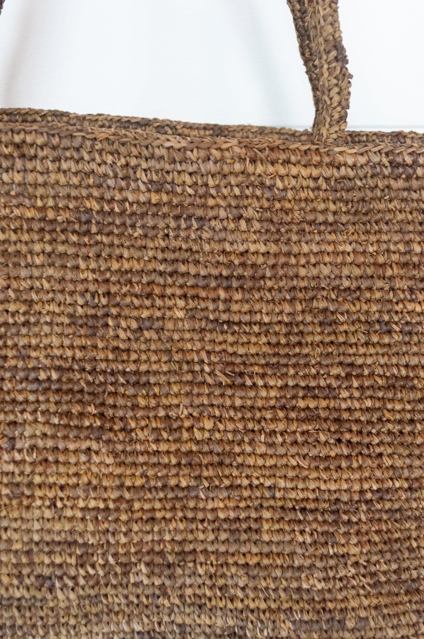 Sophie Digard crochet raffia bag, plain in shades of sand brown.