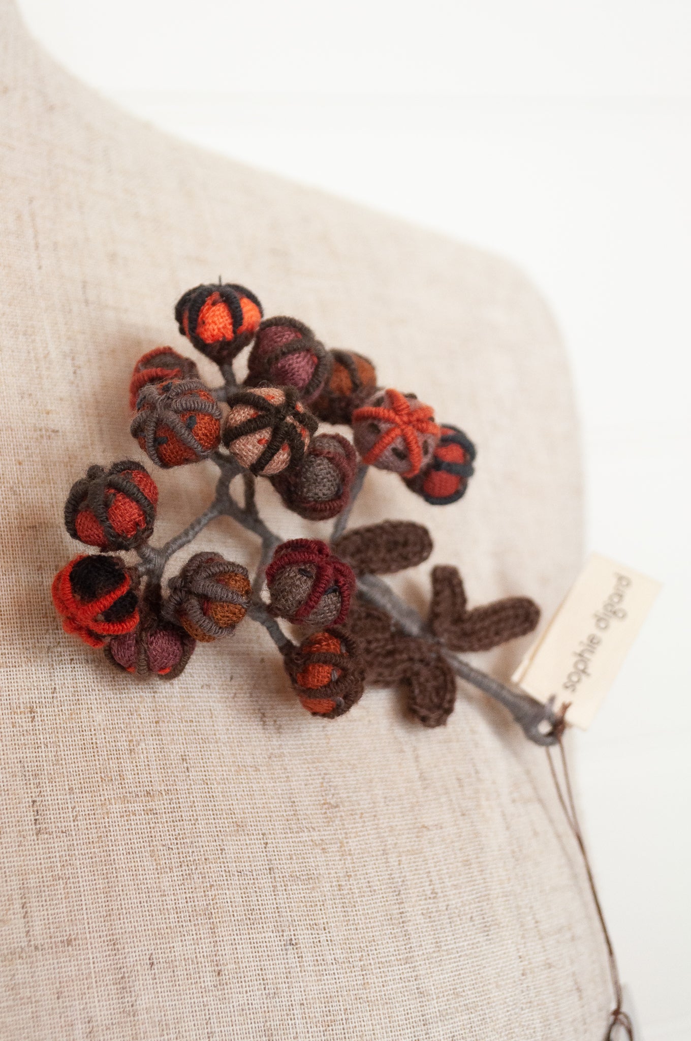 Sophie Digard handmade embroidered wool floral brooch, in autumn palette.