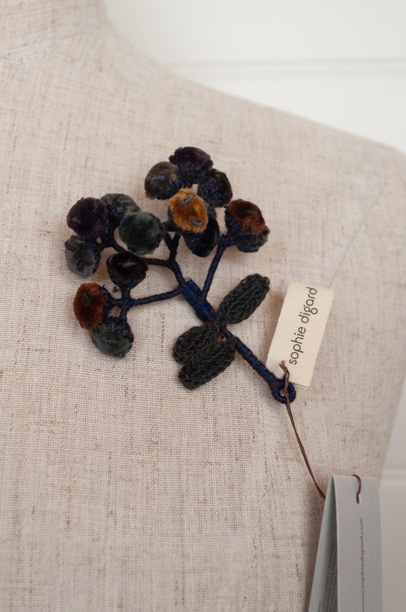 Sophie Digard handmade embroidered floral velvet brooch, in rich winter palette..