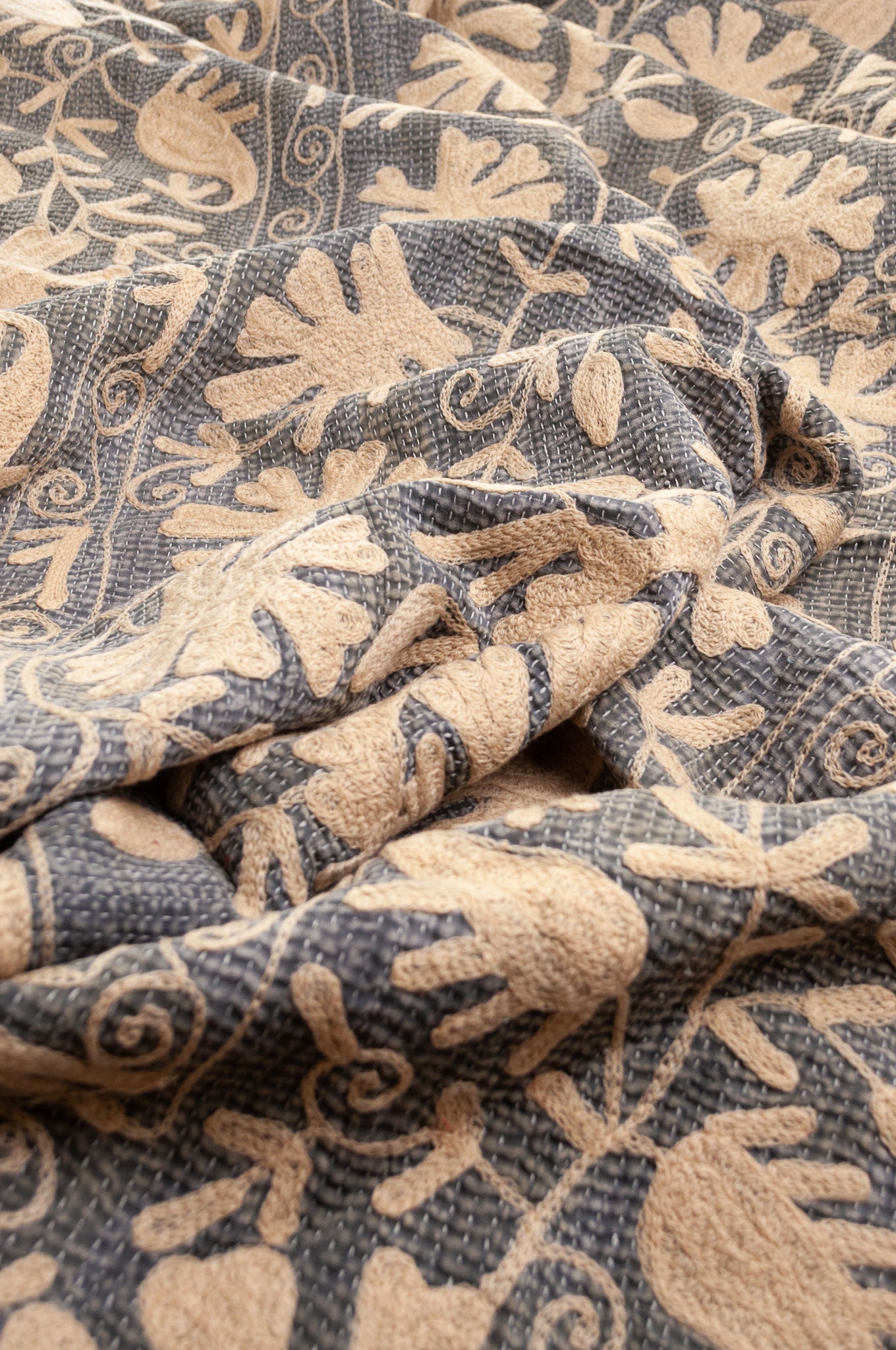 Suzani embroidered vintage kantha quilt floral design in pewter grey with vanilla cream embroidery.