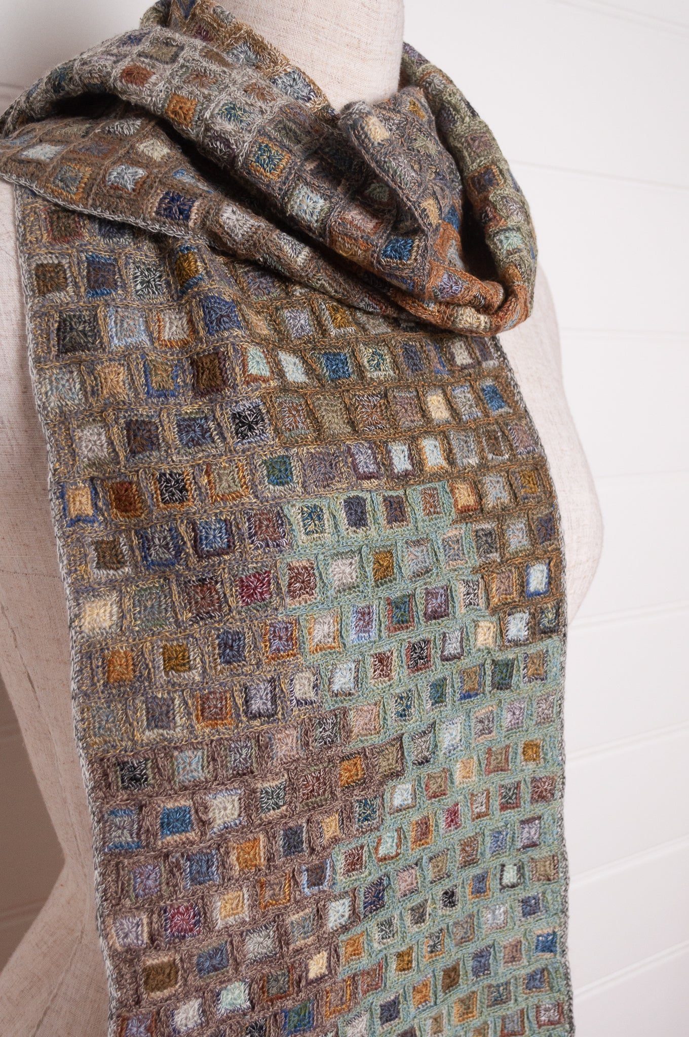 Sophie Digard crocheted wool and linen scarf multi-coloured patches in Moss palette.