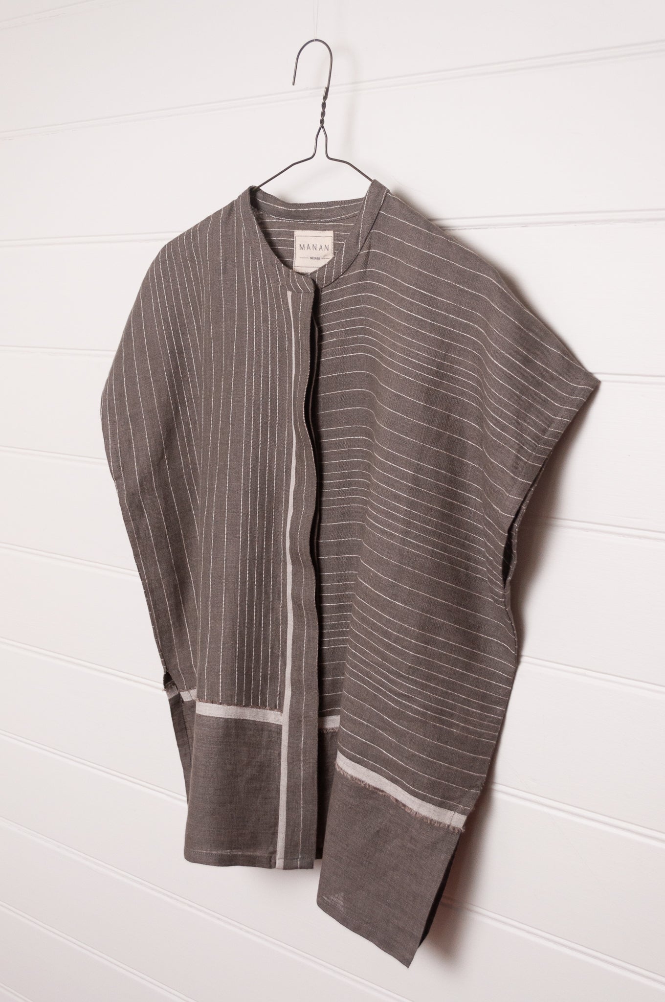 Manan Madhavi button up top in yarn-dyed grey and white stripe linen with panel detailing.