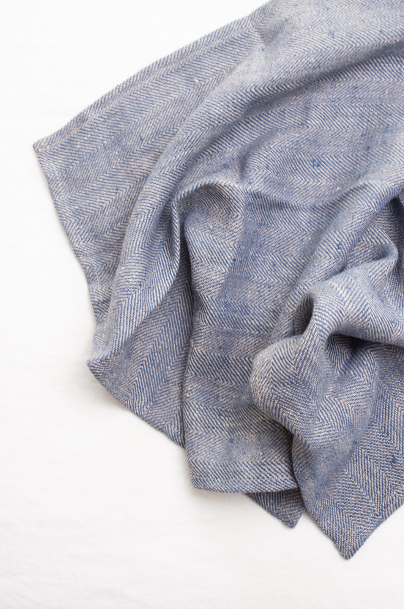Made in Lithuania pure linen chevron weave tea towel in indigo blue and white.