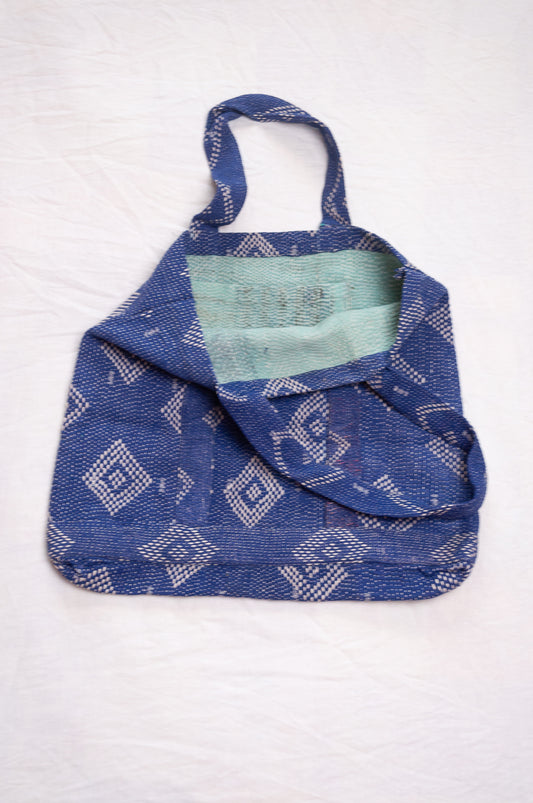Vintage embroidered kantha quilt market tote bag in sapphire blue.