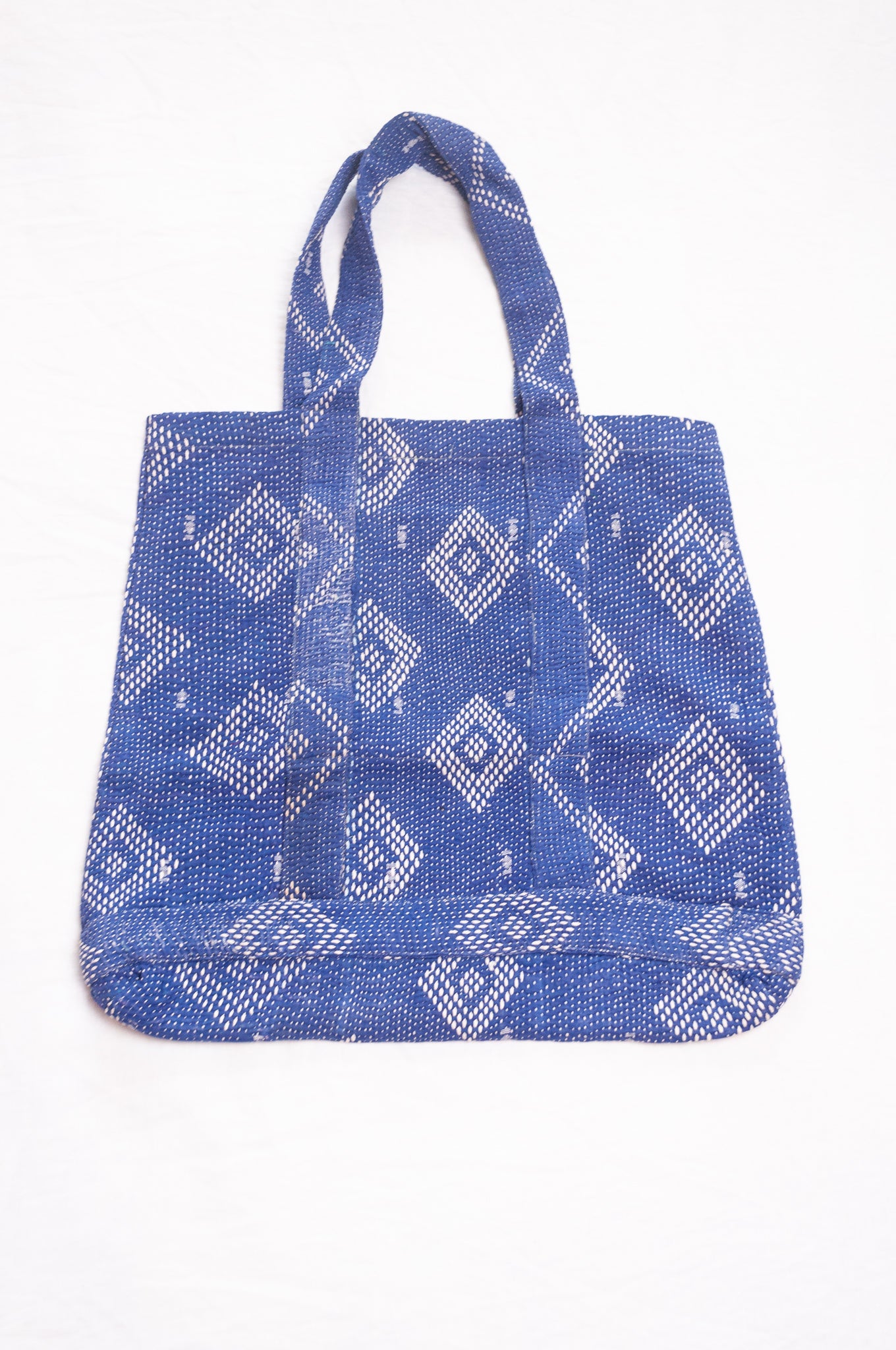 Vintage embroidered kantha quilt market tote bag in sapphire blue.