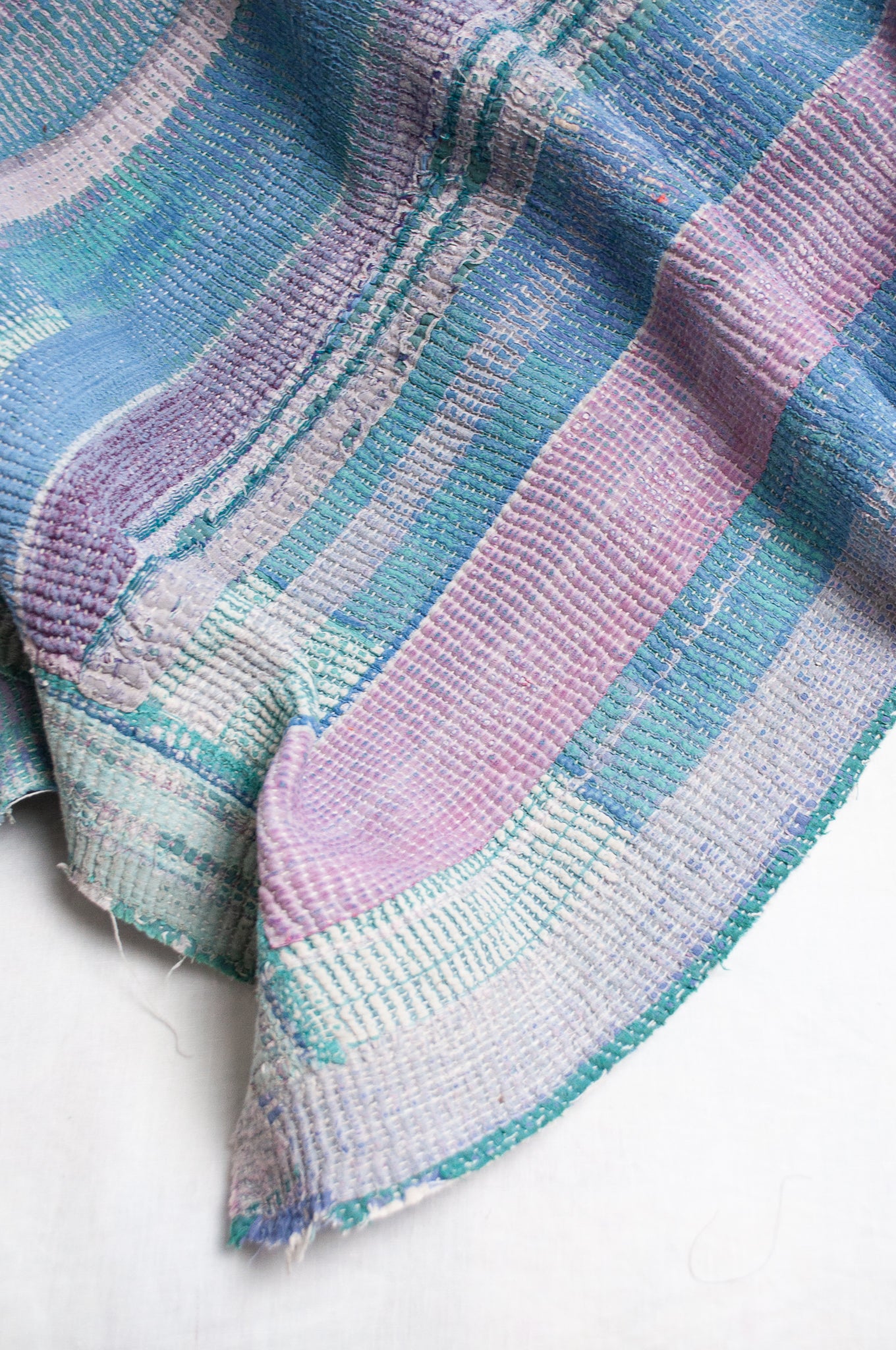 Vintage striped kantha in pinks, greens and blue.