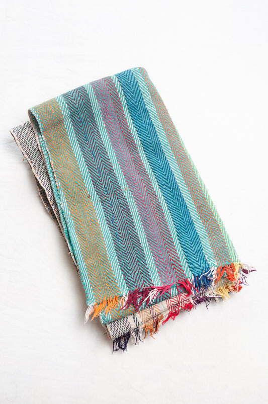 Multi-coloured stitched lohori vintage kantha quilt.
