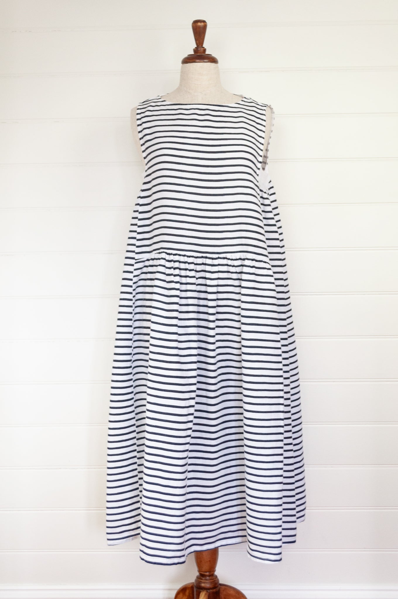 Banana Blue blue and white stripe sleeveless linen dress, with side gathers and gathered skirt.