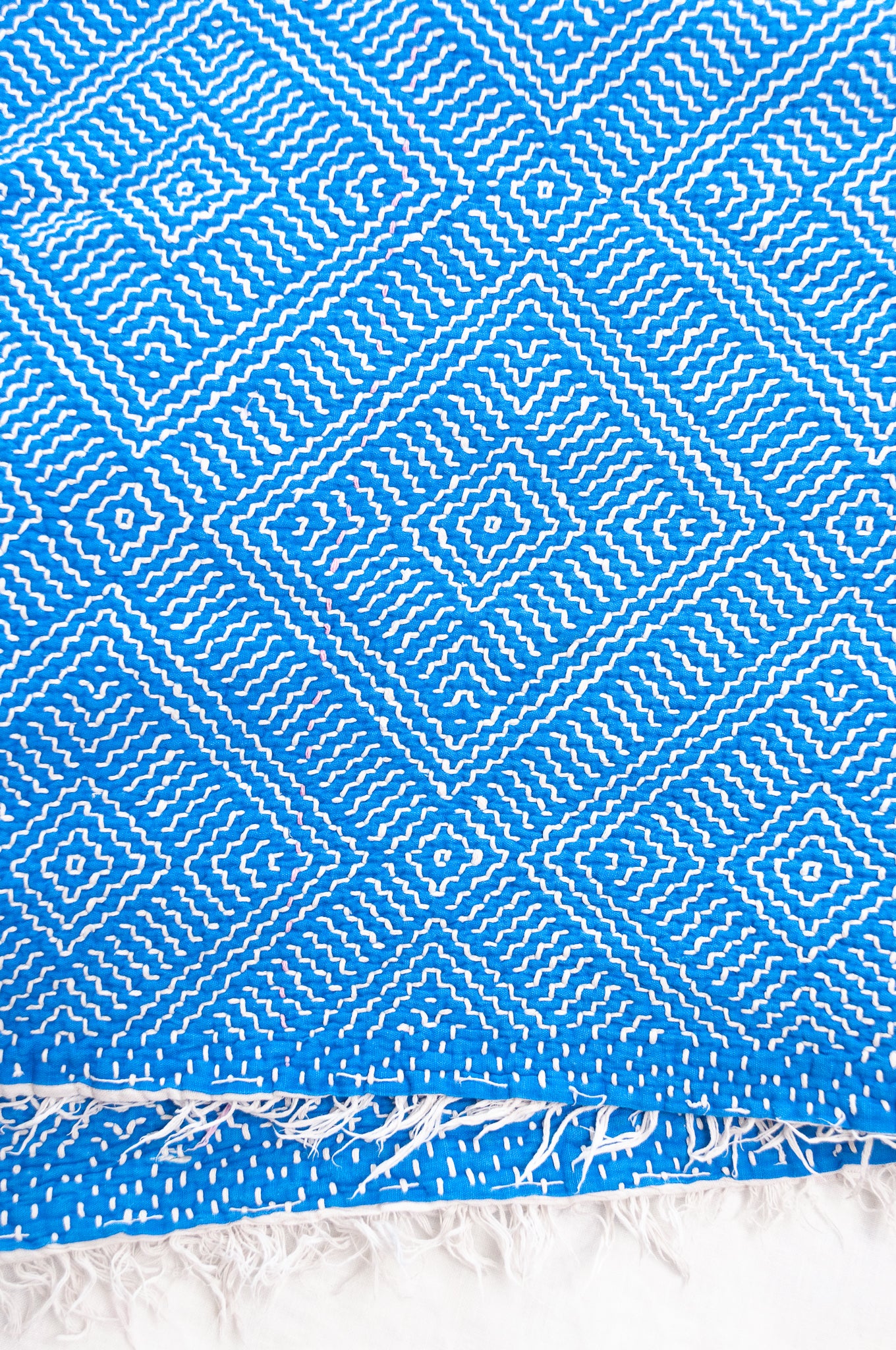 Cobalt blue and white lohori vintage kantha quilt.