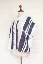 Load image into Gallery viewer, Banana Blue made in Melbourne 100% linen short sleeved button up shirt, bold navy blue stripes on white with dashes of neon orange.